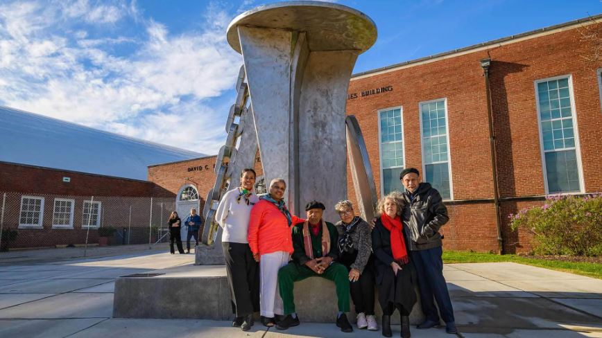 People posed in front of new Driskell statue