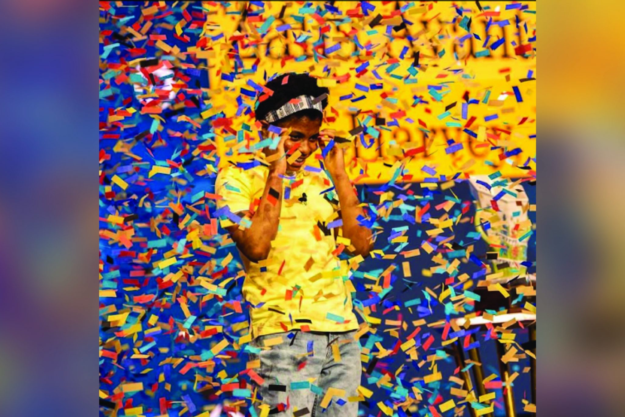 Zaila Avant-garde standing with confetti coming down