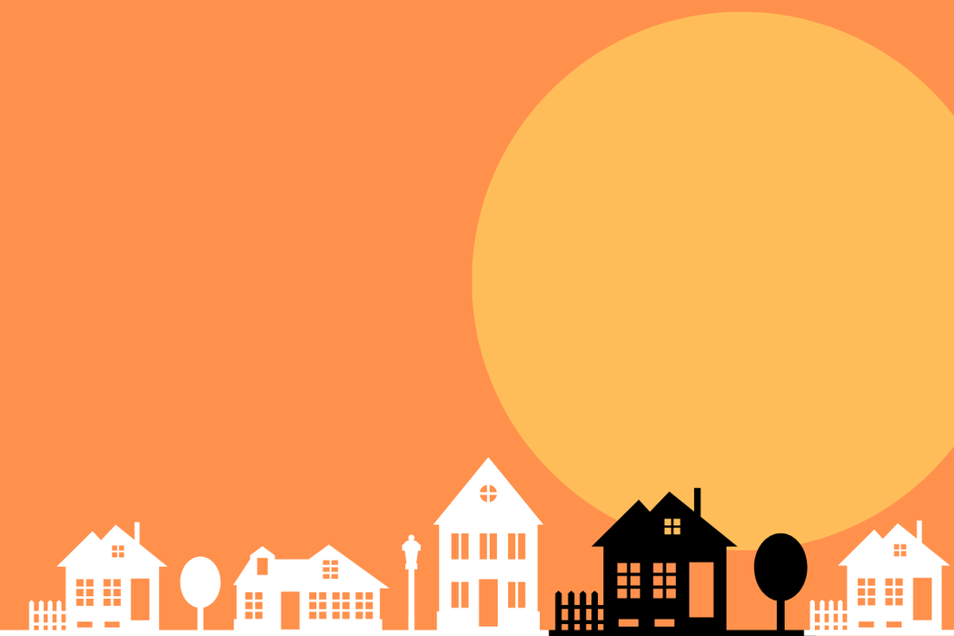 sun behind buildings